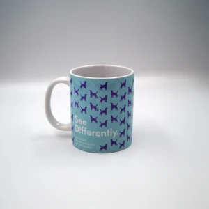 image of blue See differently Mug with purple dogs printed onto mug